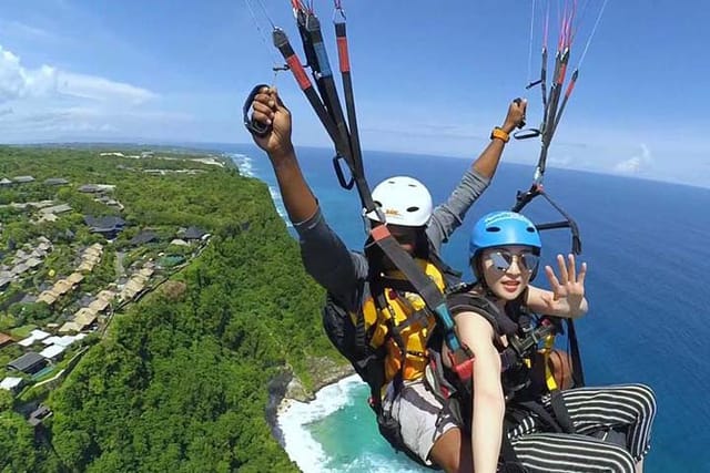 bali-paragliding-fly-swing-and-soaring-above-the-sea-with-private-transfer_1